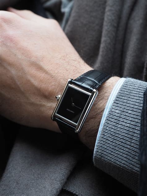 cartier tank black face